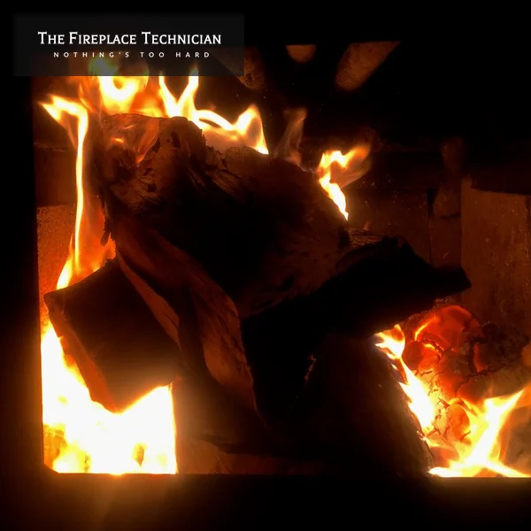 Logs burning inside a wood burner firebox
